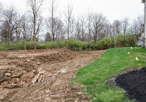How Dirty Hardscapes Disrupt Landscape Architect Drainage and Grading Plans